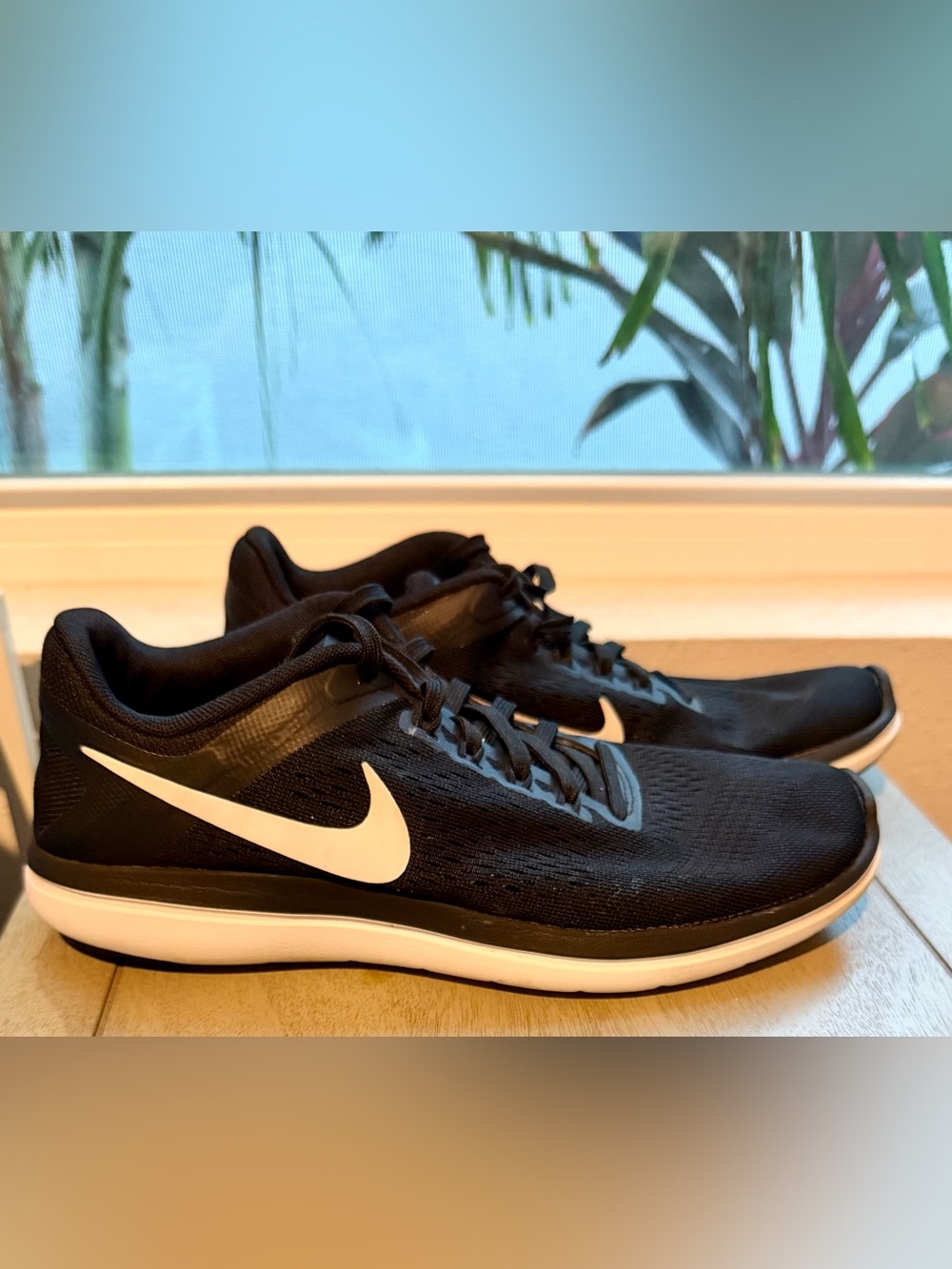 Nike Black Running Sneakers with White Swoosh